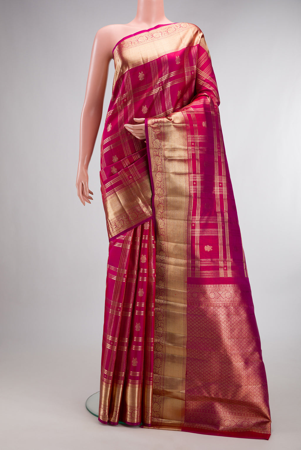 Pure Silk Dark Pink Dual Tone Kanchipuram Saree with Checked design on the body and Zari Border.  displayed on a mannequin