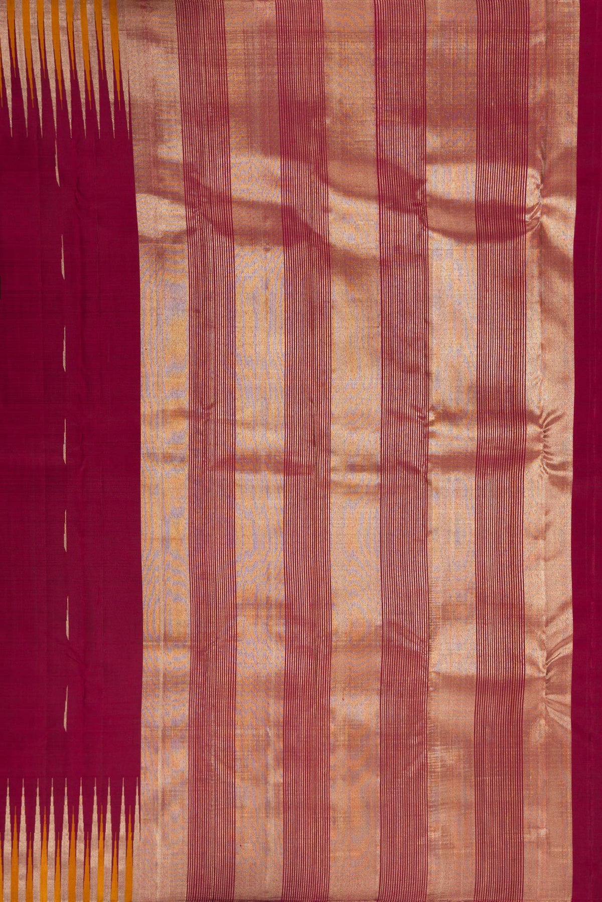 Close up image of the pallu of Pure Silk Maroon Kanjivaram Saree with Zari Butta on the body and Fancy Border. 