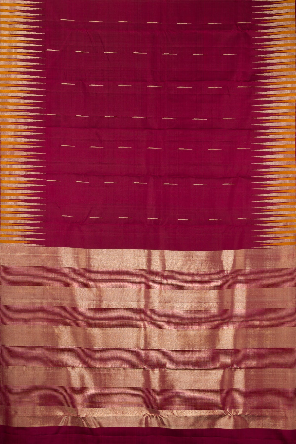 Flat view of Pure Silk Maroon Kanjivaram Saree with Zari Butta on the body and Fancy Border. 