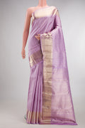 Pure Silk Lavender Kanchipuram Saree with Zari Brocade on the body and Zari Border.  displayed on a mannequin