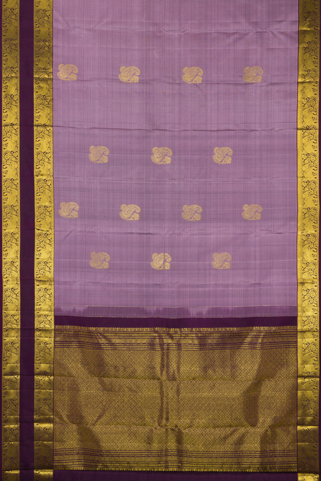 Flat view of Pure Silk Lavender Kanchipuram Saree with Zari Butta on the body and Zari Border. 