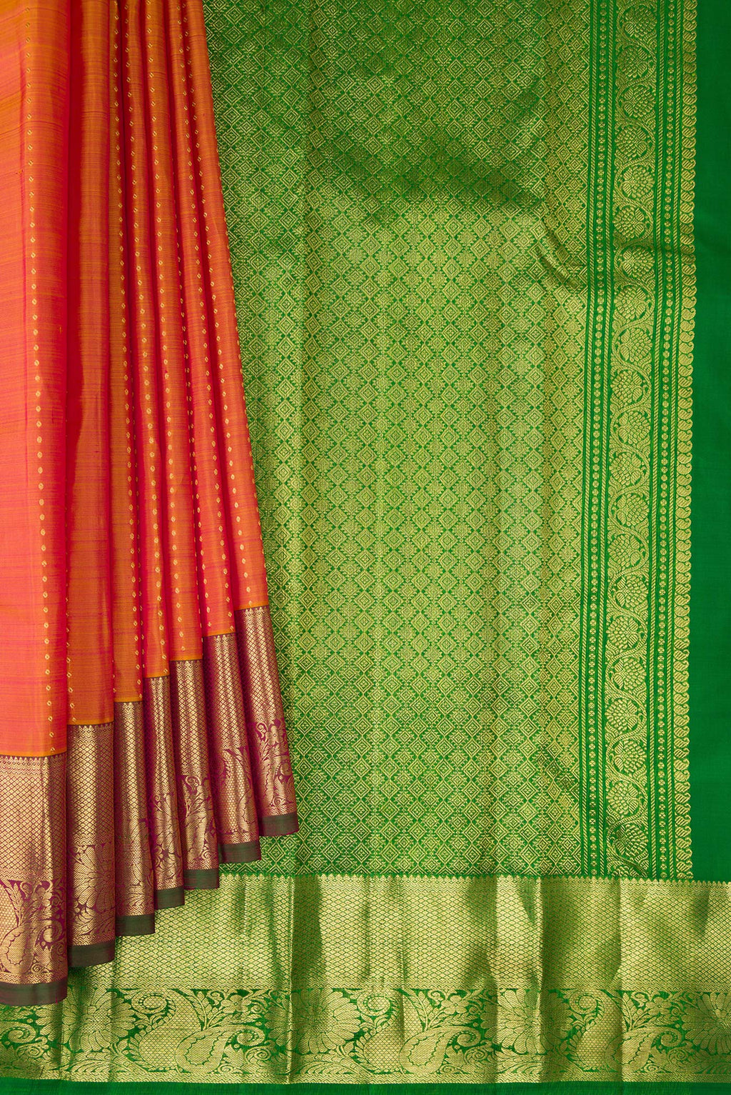 Pleats and pallu of Pure Silk Mustard Dual Tone Kanchipuram Saree with Zari Butta on the body and Zari Border. 
