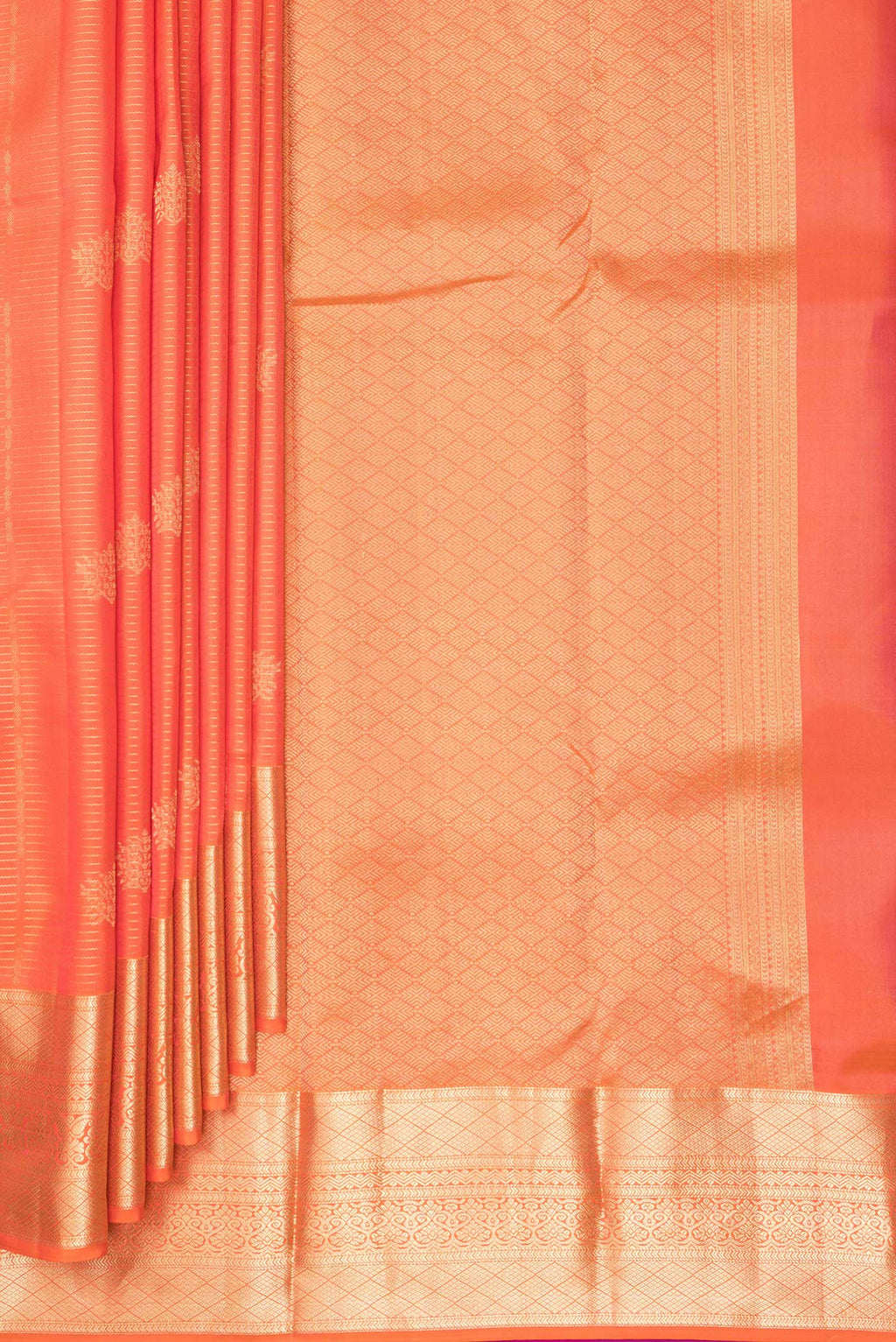 Pleats and pallu of Pure Silk Brick Orange Dual Tone Kanchipuram Saree with Stripes on the body and Zari Border. 