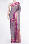 Pure Silk Purple Dual Tone Kanchipuram Saree with Zari Butta on the body and Zari Border.  displayed on a mannequin