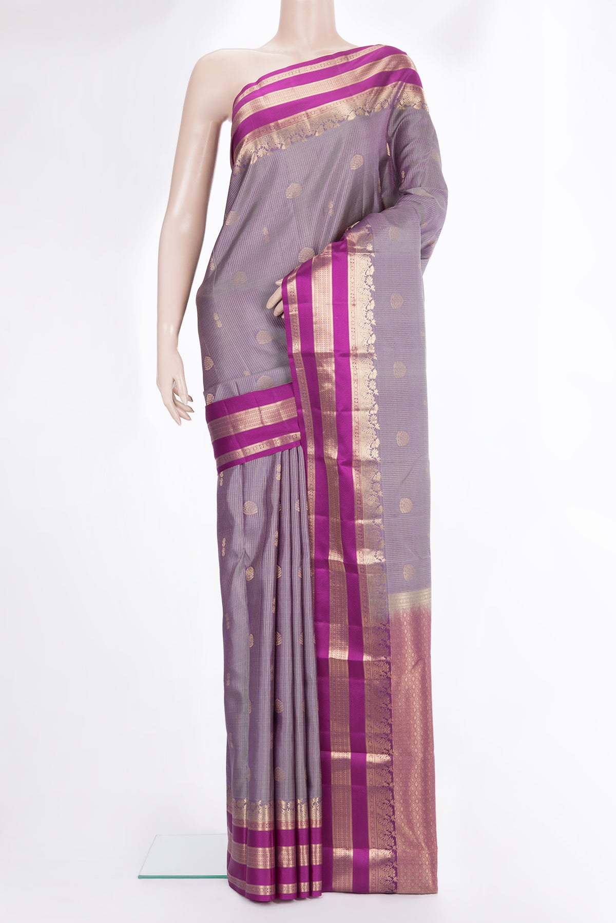 Pure Silk Purple Dual Tone Kanchipuram Saree with Zari Butta on the body and Zari Border.  displayed on a mannequin
