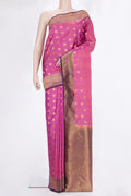 Pure Silk Pink Kanchipuram Saree with Zari Butta on the body and Zari Border.  displayed on a mannequin