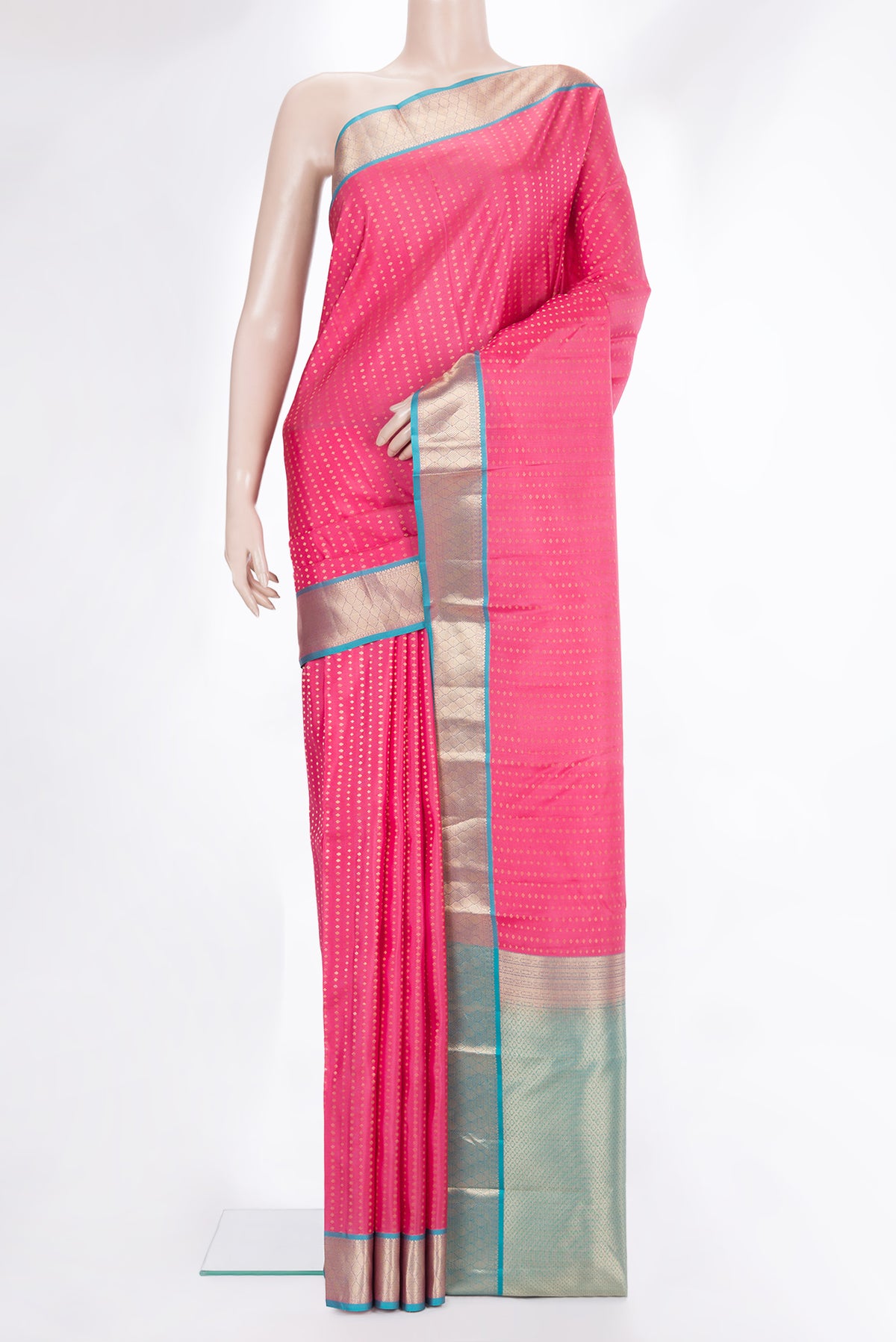 Pure Silk Pink Kanchipuram Saree with Zari Butta on the body and Zari Border.  displayed on a mannequin