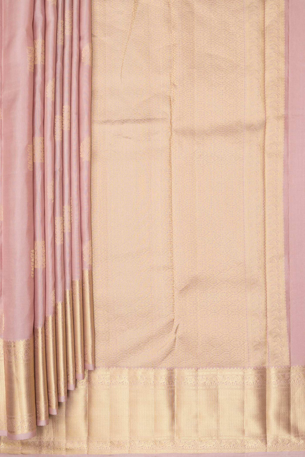 Pleats and pallu of Pure Silk Rose Gold Kanchipuram Saree with Zari Butta on the body and Zari Border. 