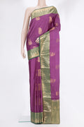 Pure Silk Pink Kanchipuram Saree with Zari Butta on the body and Fancy Border.  displayed on a mannequin