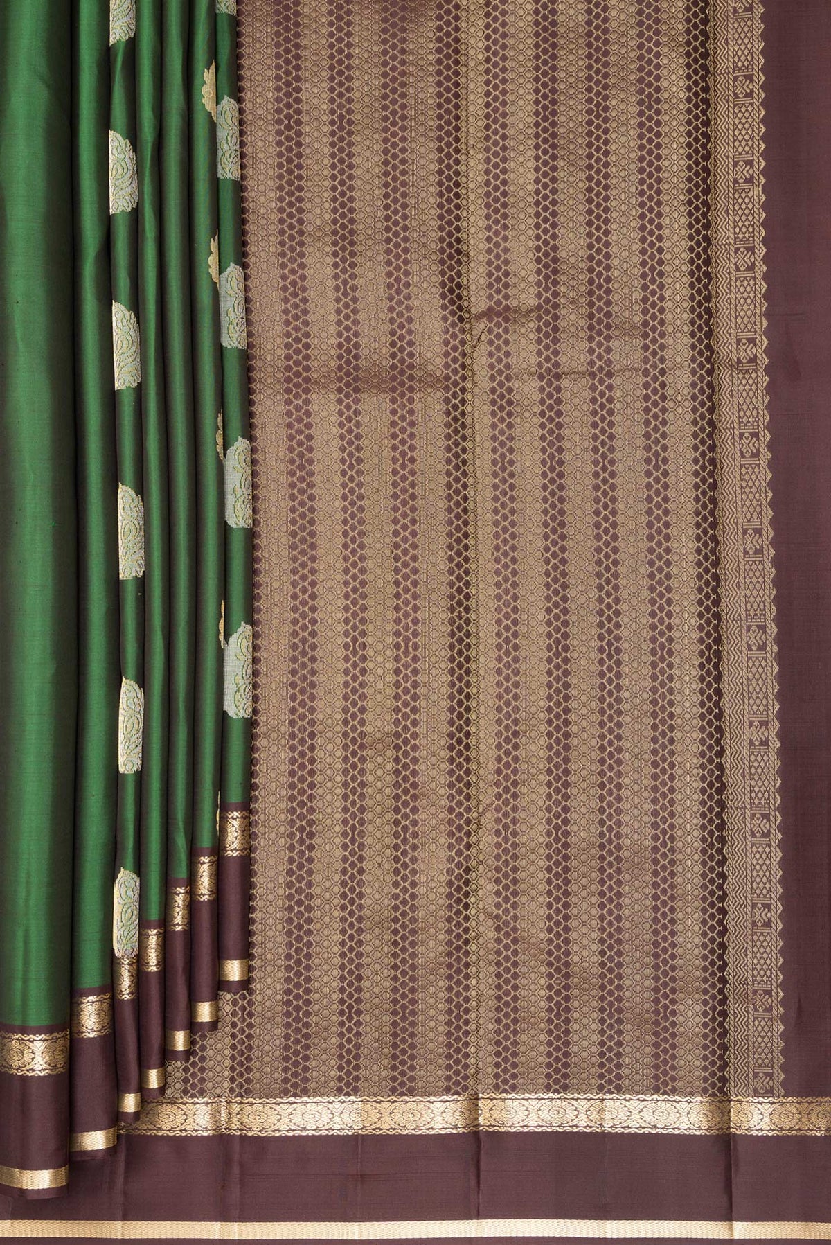 Pleats and pallu of Pure Silk Green Kanchipuram Saree with Zari Butta on the body and Zari Border. 