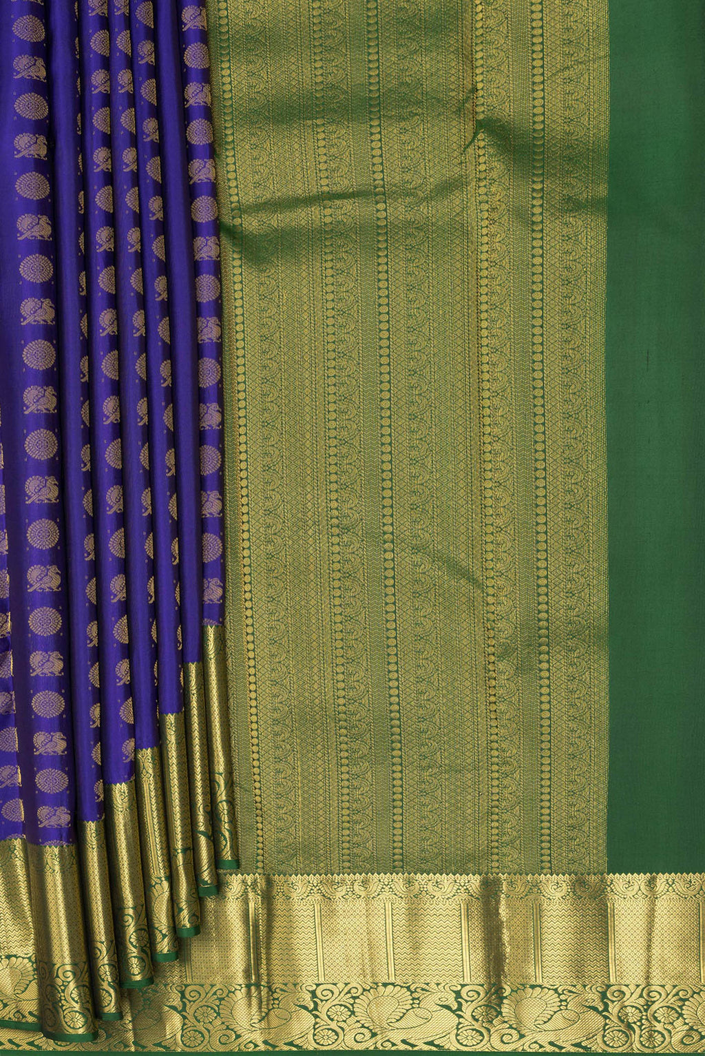 Pleats and pallu of Pure Silk Dark Blue Kanchipuram Saree with Zari Butta on the body and Zari Border. 