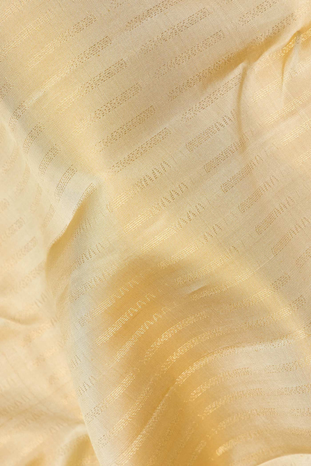 Close up of Pure Silk Beige Kanchipuram Saree with Stripes on the body and Zari Border.  displaying folds