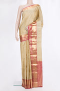 Pure Silk Beige Kanchipuram Saree with Stripes on the body and Zari Border.  displayed on a mannequin
