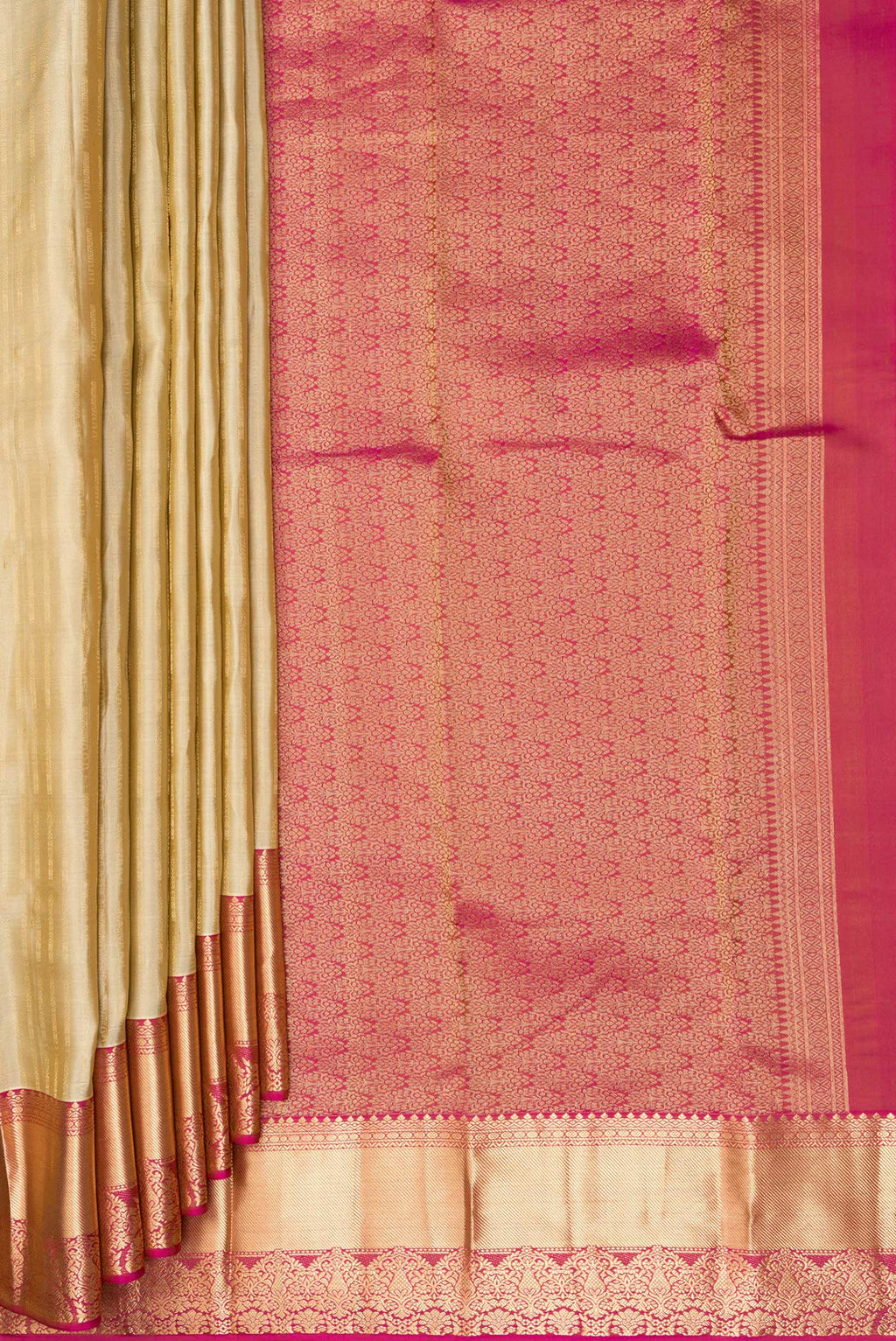 Pleats and pallu of Pure Silk Beige Kanchipuram Saree with Stripes on the body and Zari Border. 