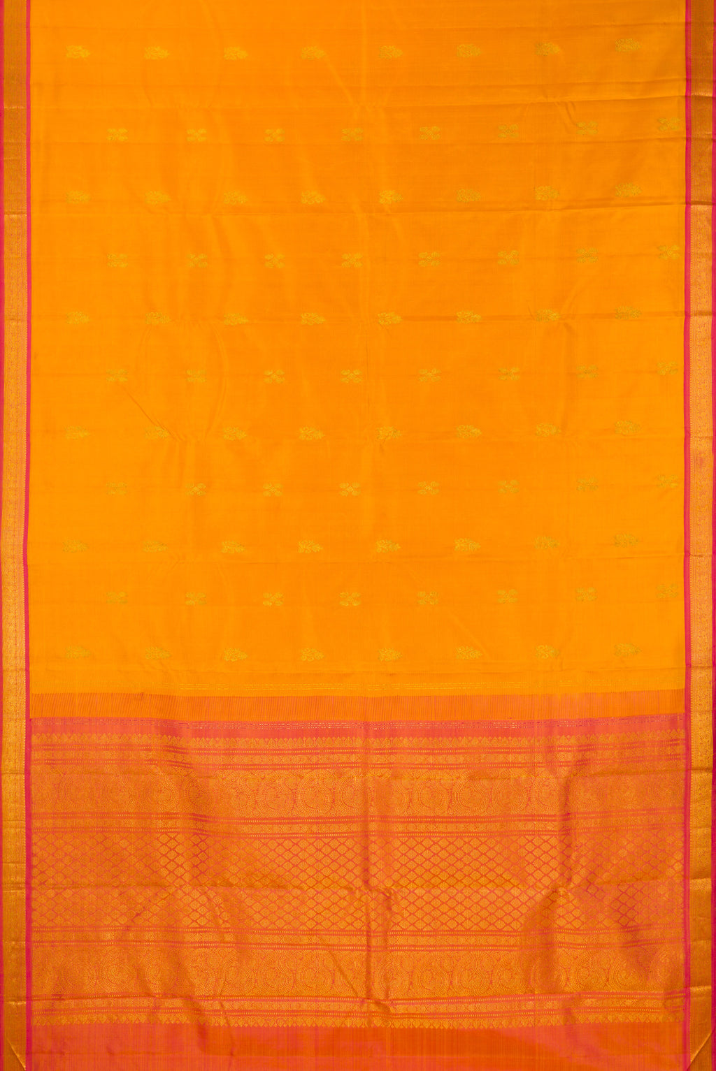 Flat view of Pure Silk Mustard Kanchipuram Saree with Zari Butta on the body and Zari Border. 