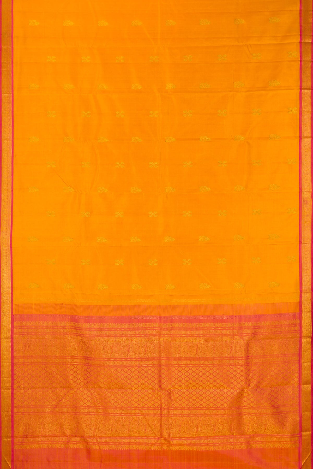 Flat view of Pure Silk Mustard Kanchipuram Saree with Zari Butta on the body and Zari Border. 