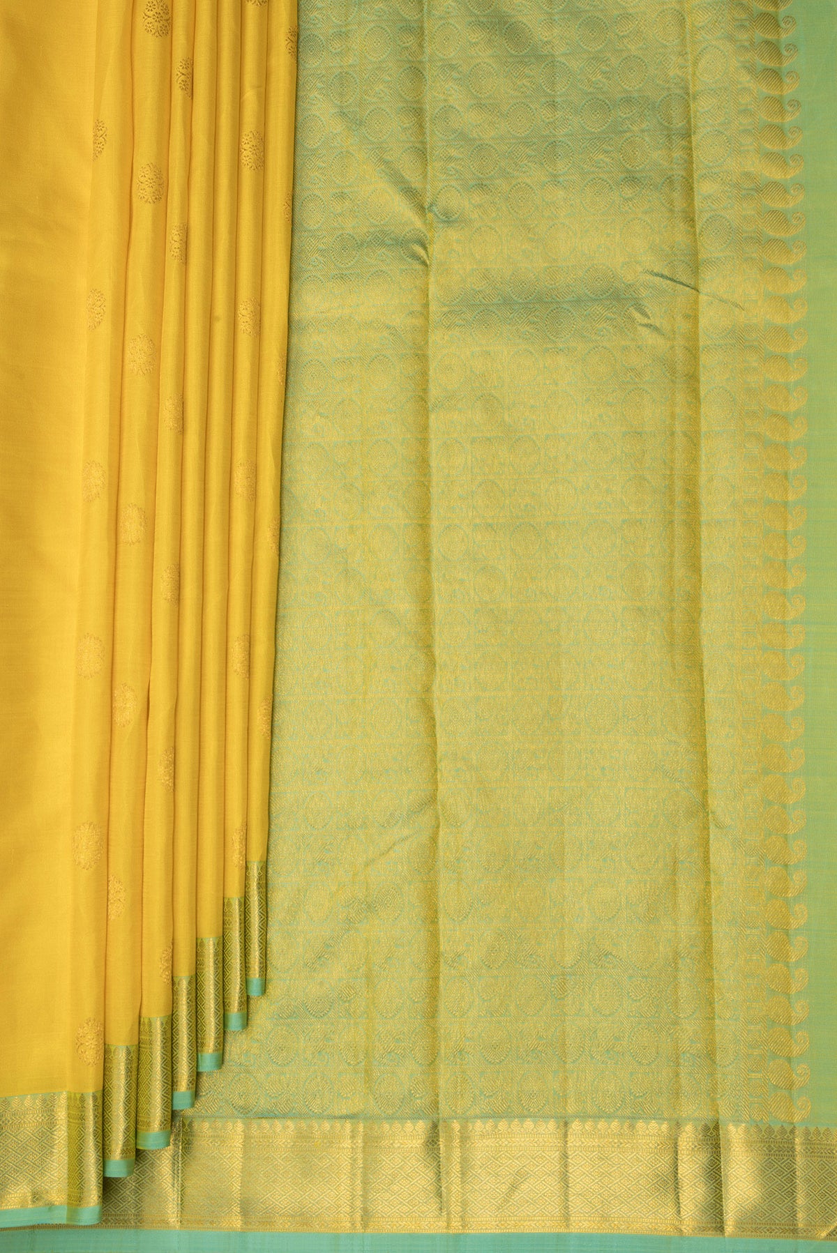 Pleats and pallu of Pure Silk Yellow Kanchipuram Saree with Zari Butta on the body and Zari Border. 