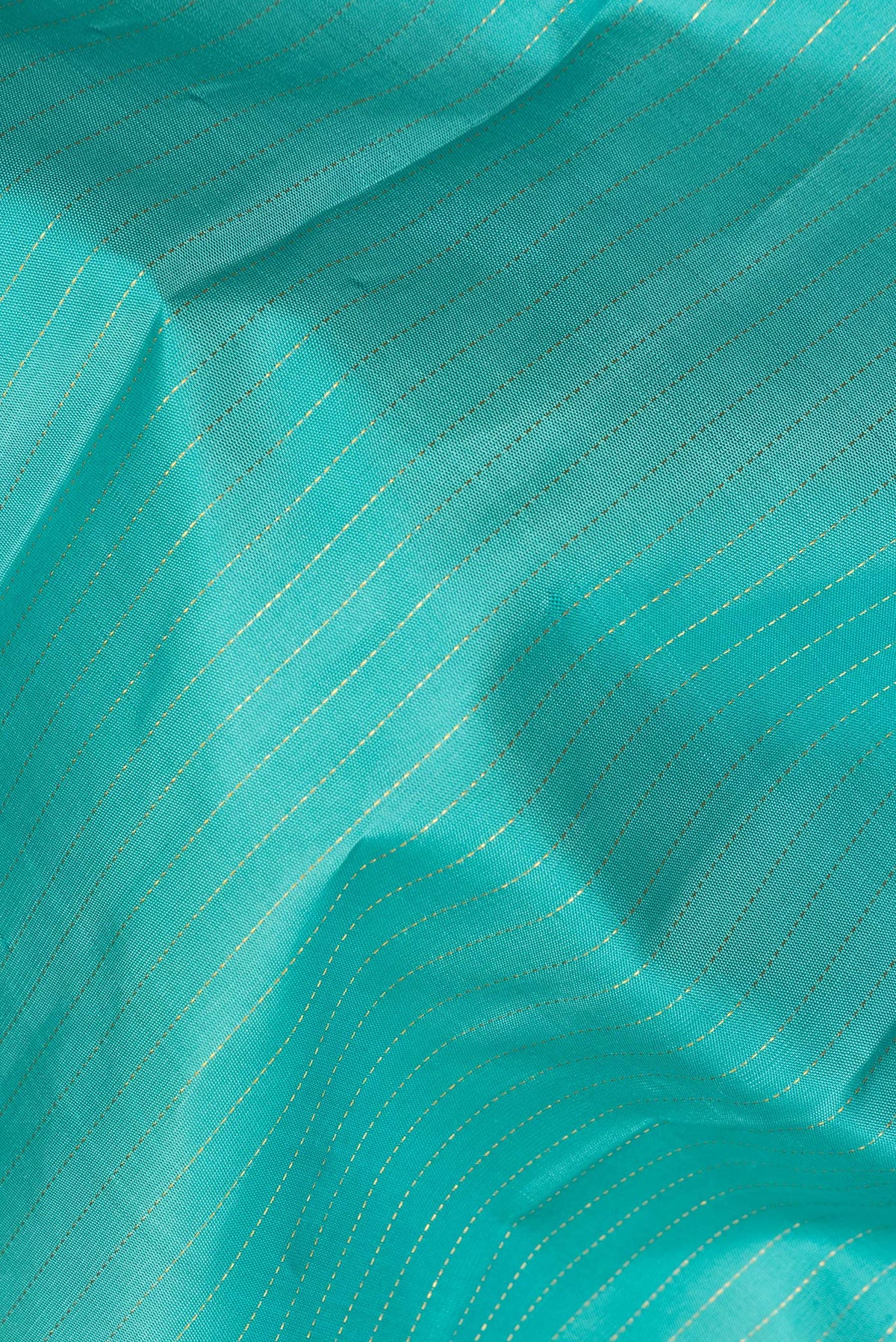 Close up of Pure Silk Sky Blue Dual Tone Kanjivaram Saree with Stripes on the body and Zari Border.  displaying folds