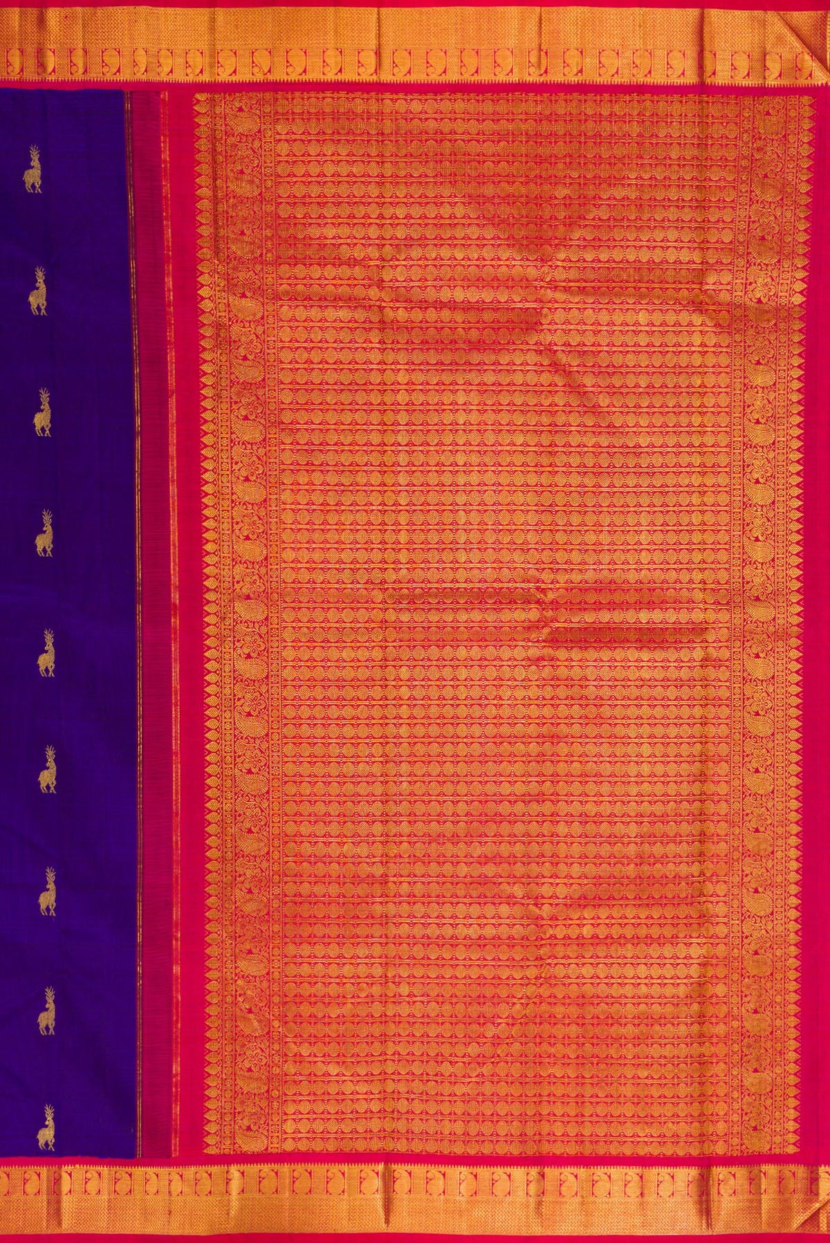 Close up image of the pallu of Pure Silk Royal Blue Kanjivaram Saree with Zari Butta on the body and Zari Border. 