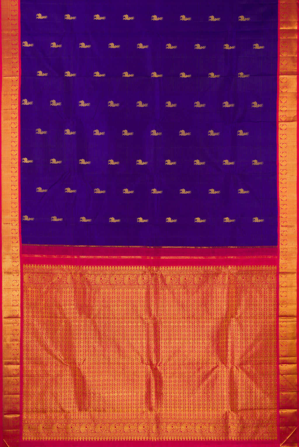 Flat view of Pure Silk Royal Blue Kanjivaram Saree with Zari Butta on the body and Zari Border. 