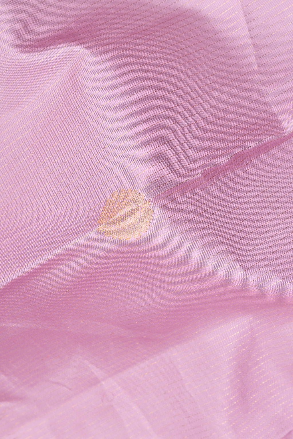 Close up of Pure Silk Rose pink Kanjivaram Saree with Stripes on the body and Zari Border.  displaying folds