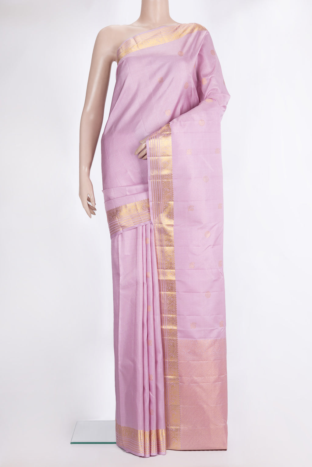 Pure Silk Rose pink Kanjivaram Saree with Stripes on the body and Zari Border.  displayed on a mannequin