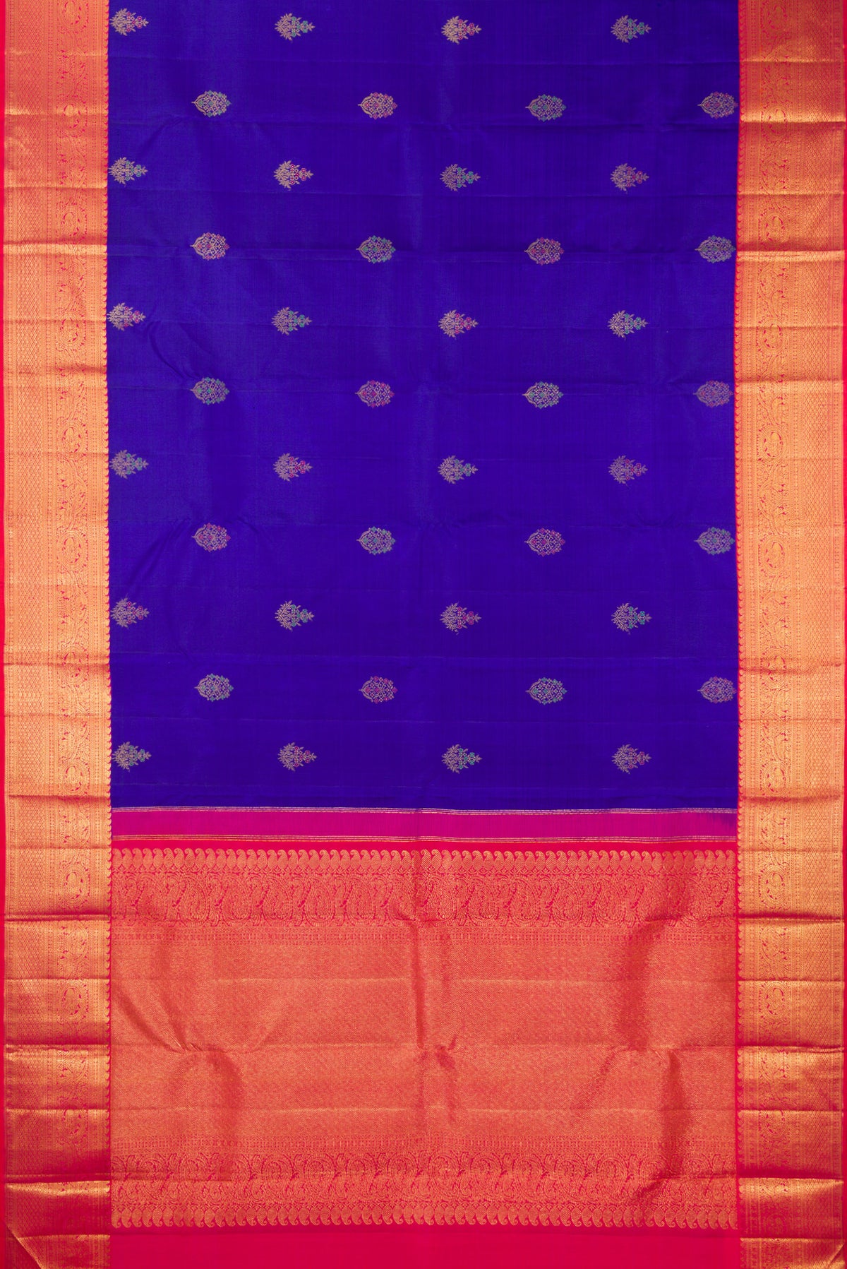 Flat view of Pure Silk Royal Blue Kanjivaram Saree with Zari And Thread Butta on the body and Zari Border. 