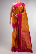 Pure Silk Mustard Kanjivaram Saree with Checked design on the body and Zari Border.  displayed on a mannequin