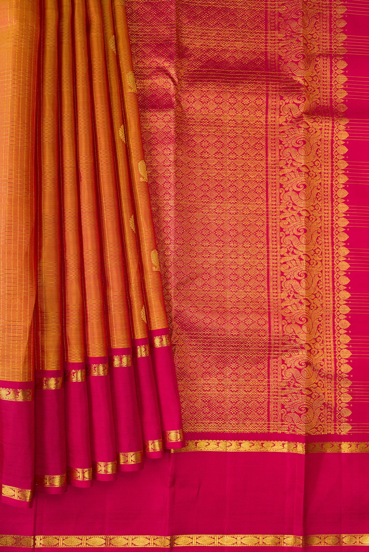 Pleats and pallu of Pure Silk Mustard Kanjivaram Saree with Checked design on the body and Zari Border. 