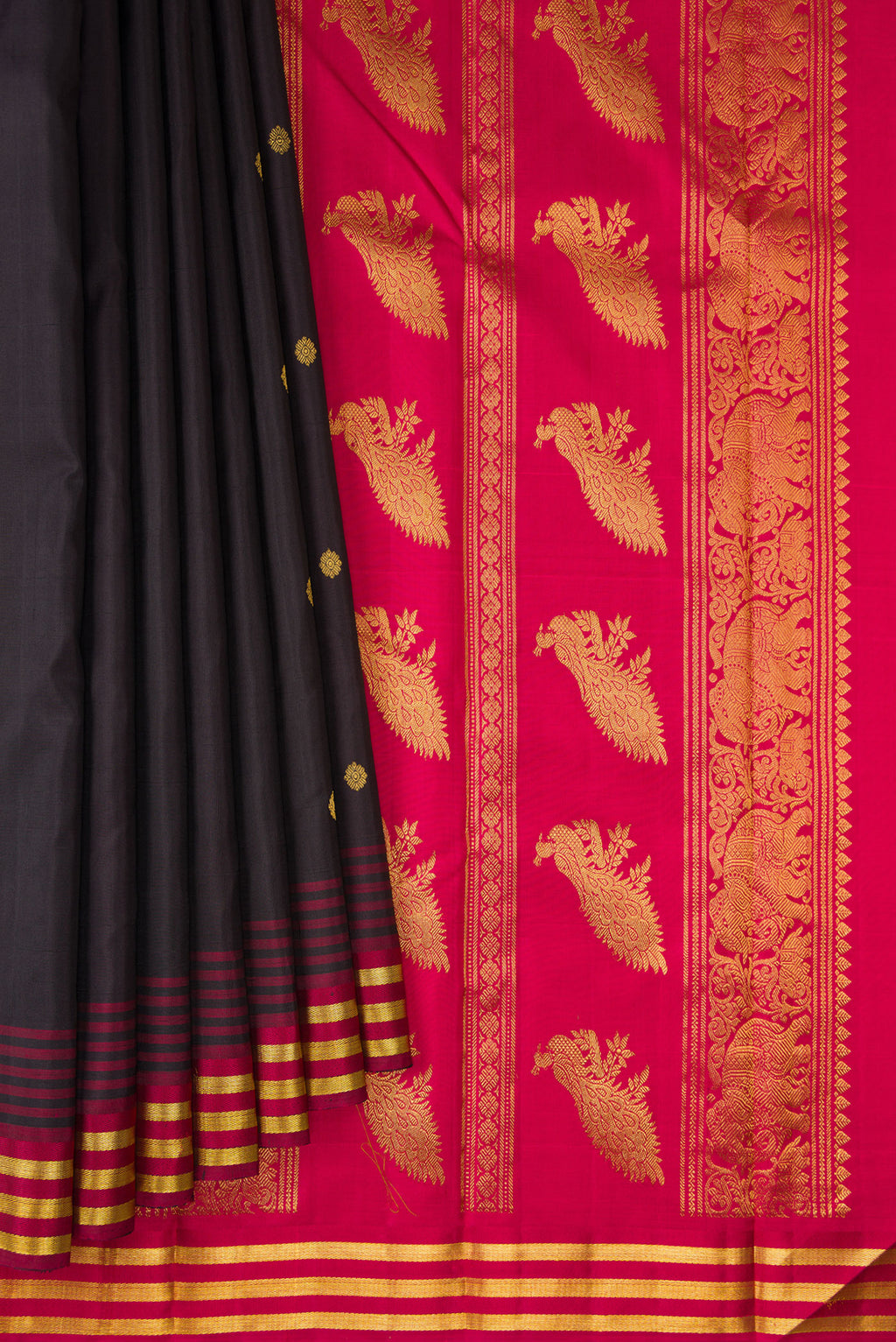 Pleats and pallu of Pure Silk Coffee Brown Kanjivaram Saree with Zari Butta on the body and Ganga Jamuna Border. 