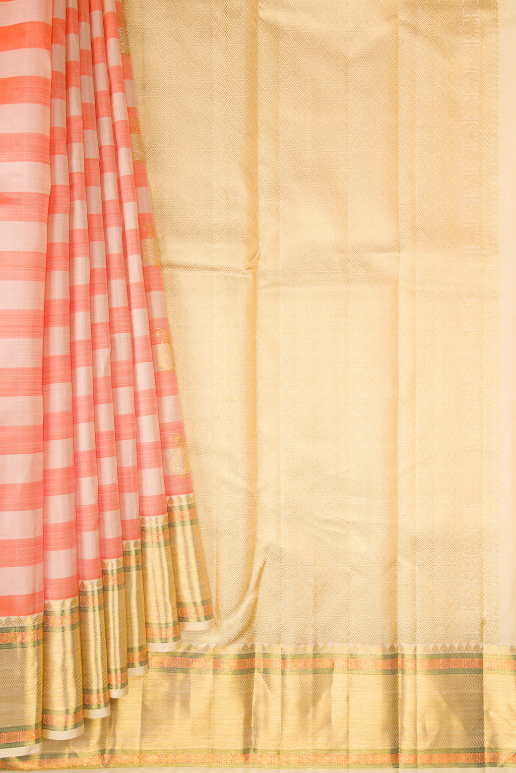 Pleats and pallu of Pure Silk Beige and Peach Color Kanjivaram Saree with Stripes on the body and Zari Border. 
