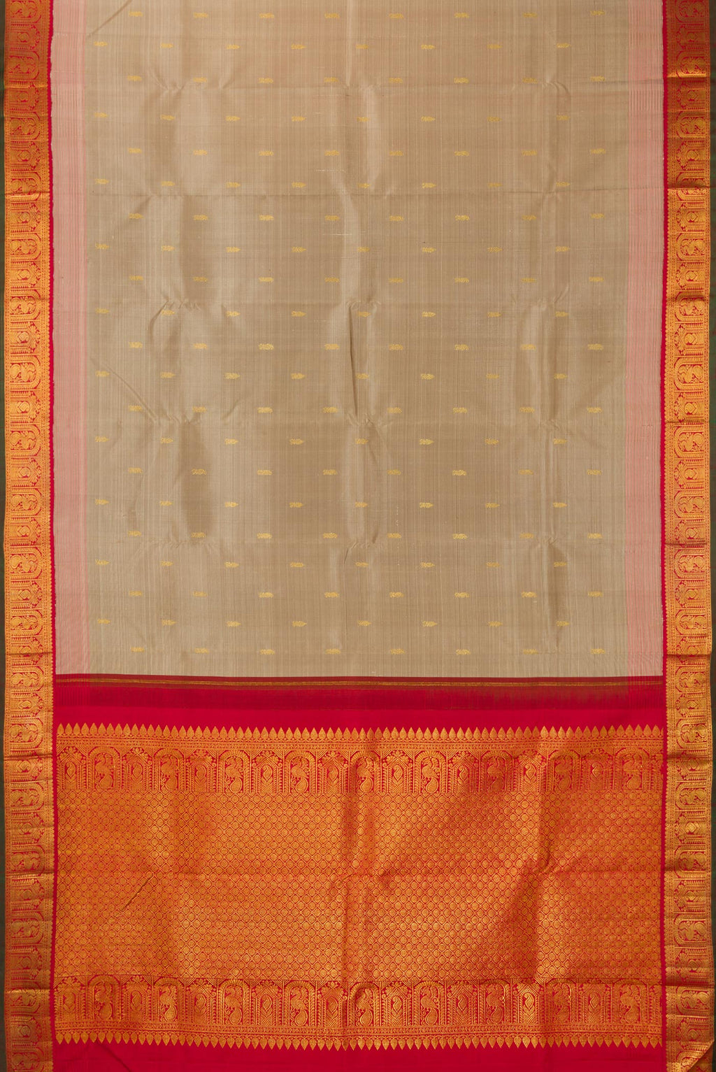 Flat view of Pure Silk Dark Beige Kanjivaram Saree with Zari Butta on the body and Zari Border. 