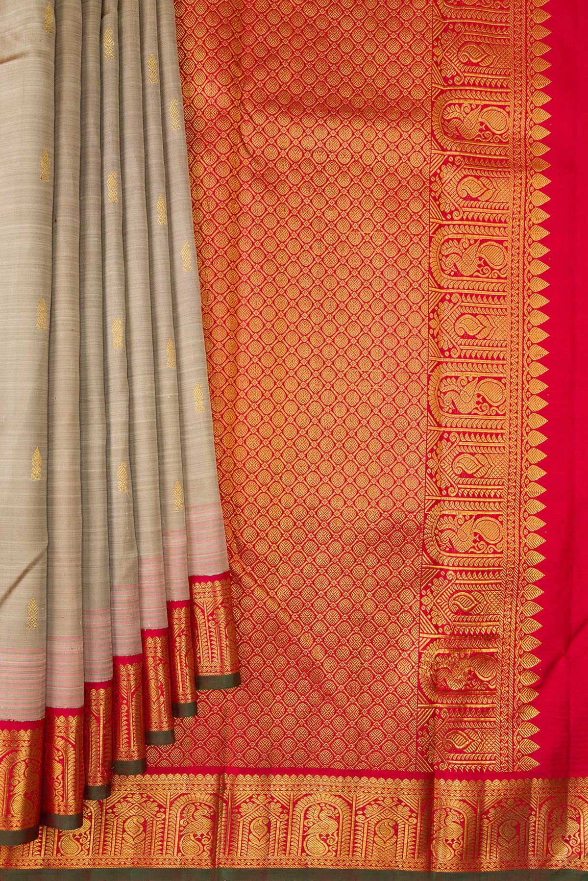 Pleats and pallu of Pure Silk Dark Beige Kanjivaram Saree with Zari Butta on the body and Zari Border. 
