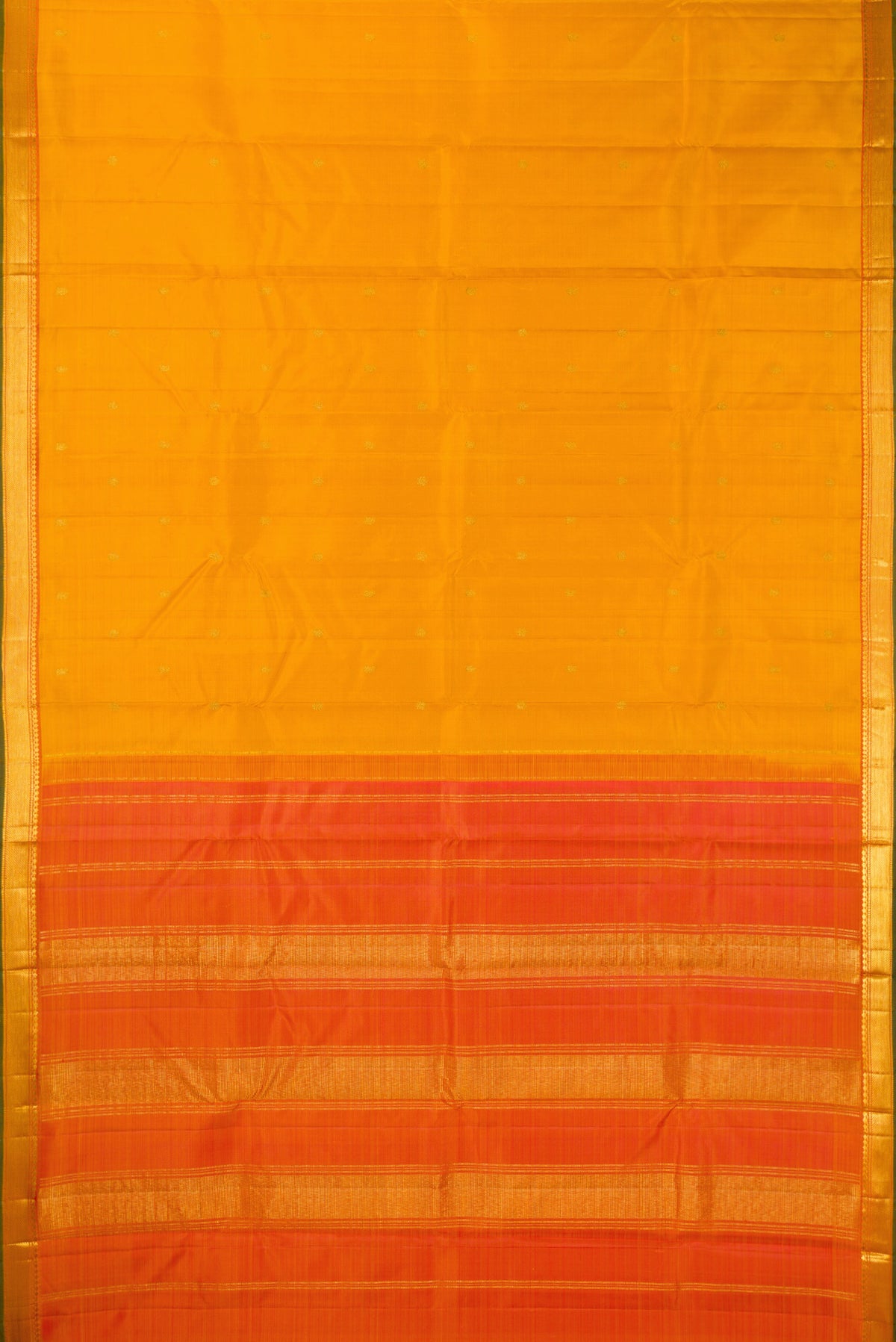 Flat view of Pure Silk Mustard Kanchipuram Saree with Zari Butta on the body and Zari Border. 
