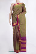 Pure Silk Mehandi Green Dual Tone Kanchipuram Saree with Zari Butta on the body and Zari Border.  displayed on a mannequin