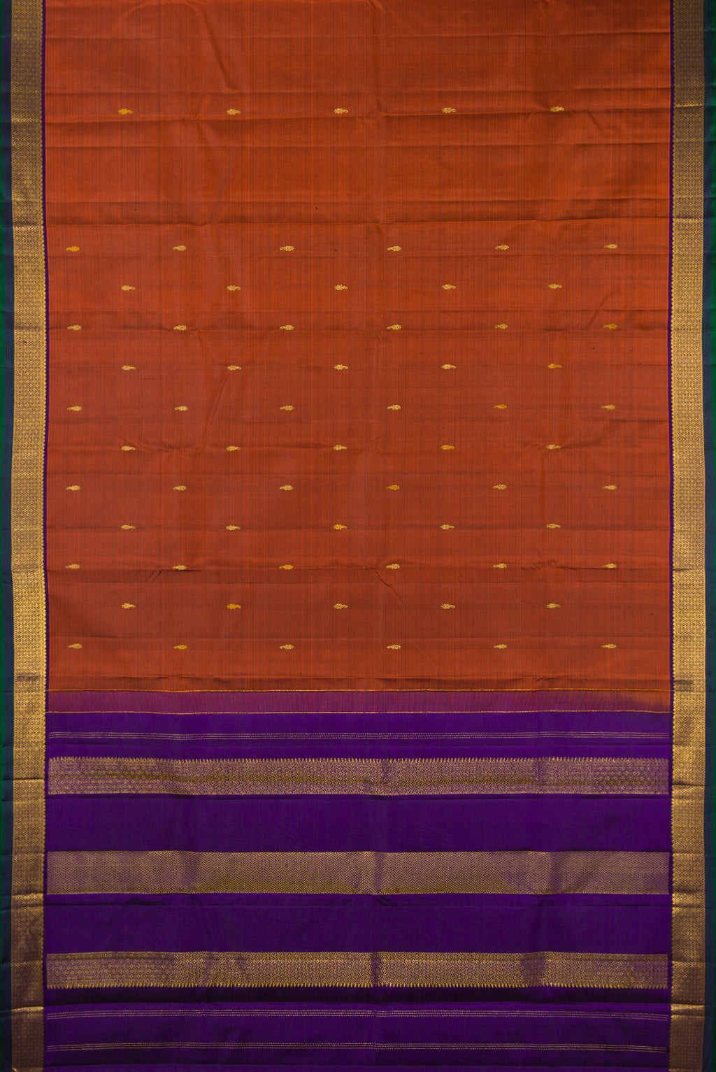 Flat view of Pure Silk Rust Kanchipuram Saree with Zari Butta on the body and Zari Border. 