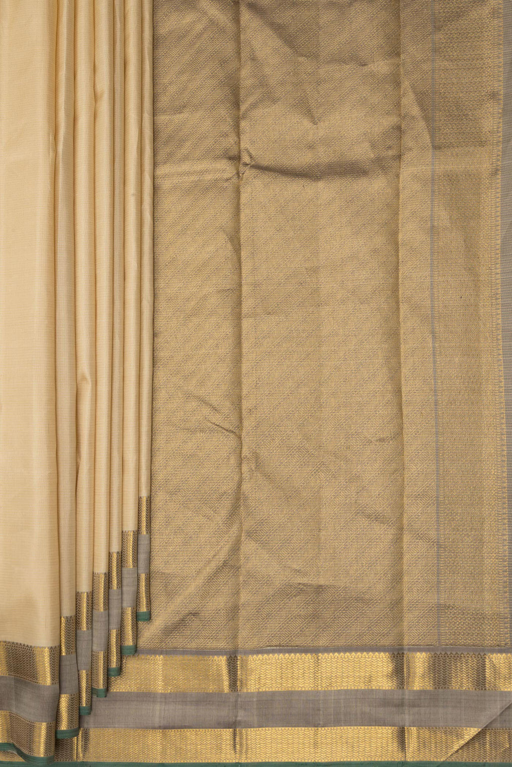 Pleats and pallu of Pure Silk Beige Kanjivaram Saree with Zari Butta on the body and Zari Border. 