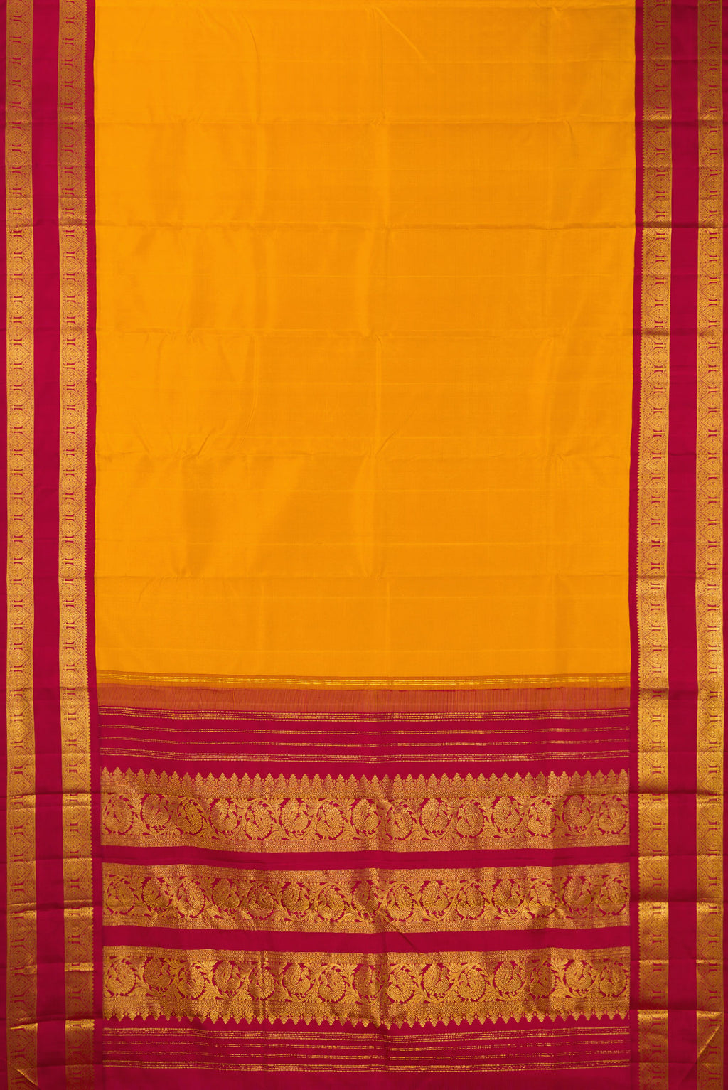 Flat view of Pure Silk Mustard Kanjivaram Saree with Plain Body and Zari Border. 