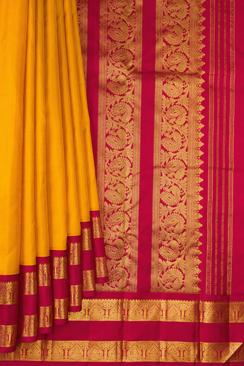 Pleats and pallu of Pure Silk Mustard Kanjivaram Saree with Plain Body and Zari Border. 