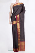Pure Silk Brown Kanchipuram Saree with Plain Body and Zari Border.  displayed on a mannequin
