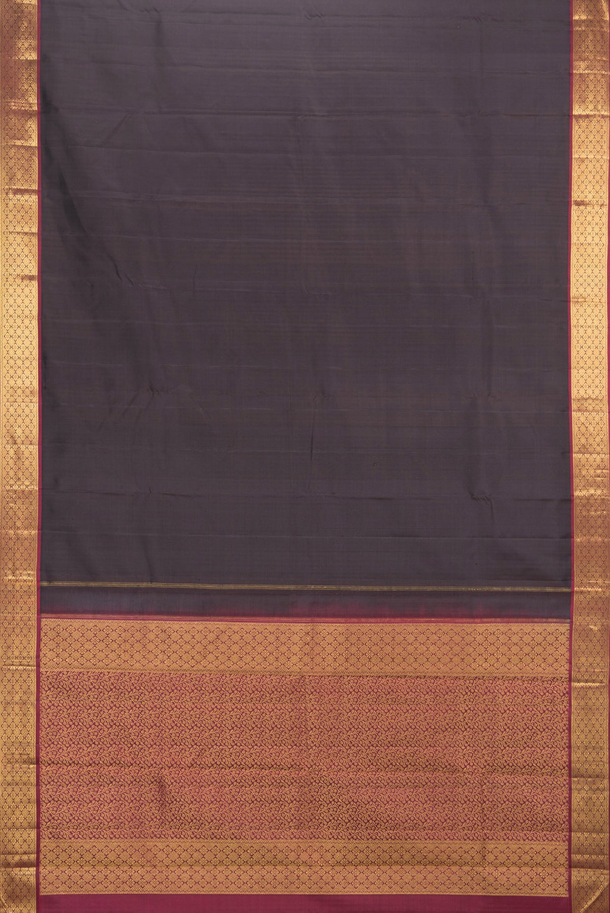 Flat view of Pure Silk Brown Kanchipuram Saree with Plain Body and Zari Border. 