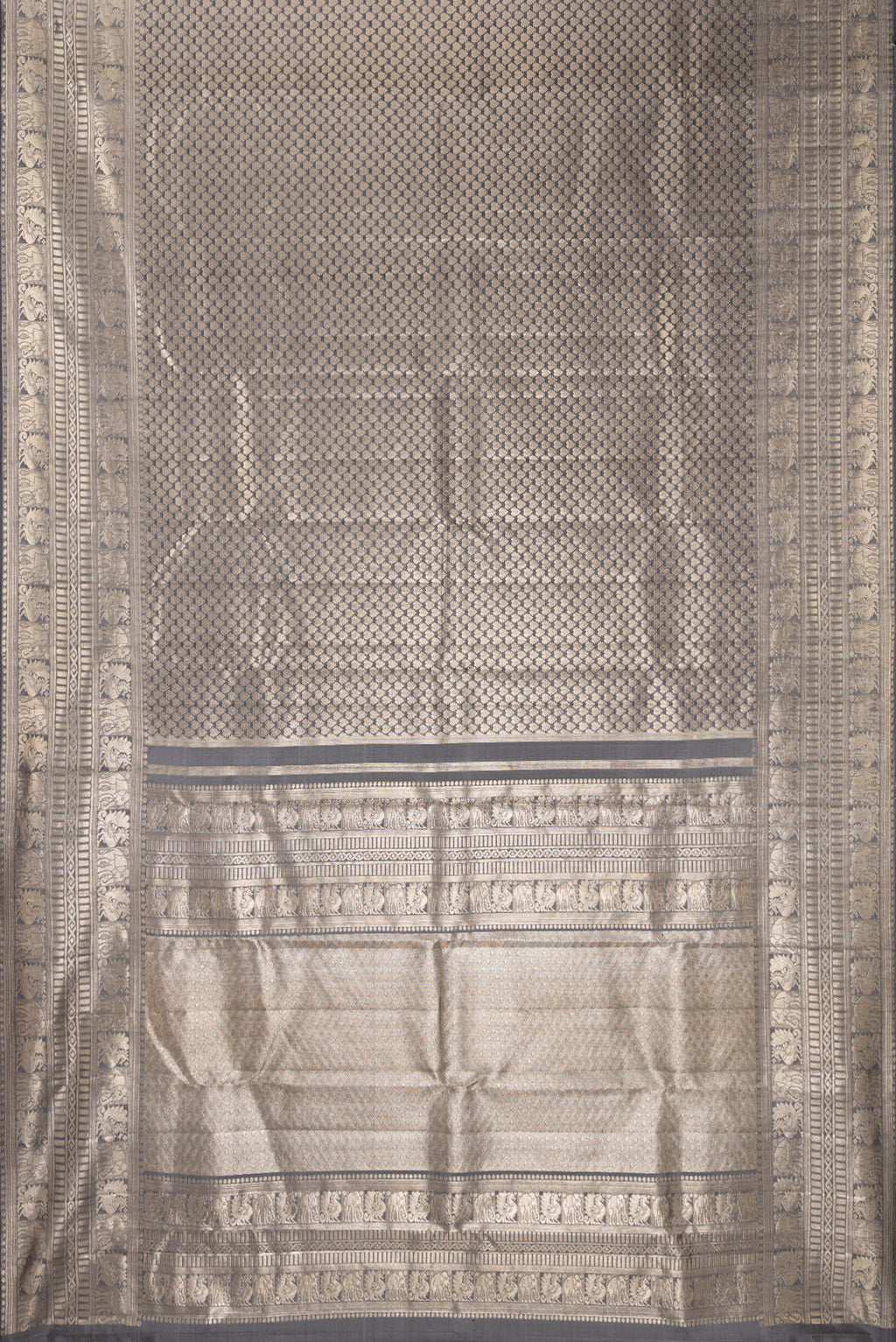 Flat view of Grey Kanchipuram Tissue Saree with Zari Brocade on the body and Fancy Border. 