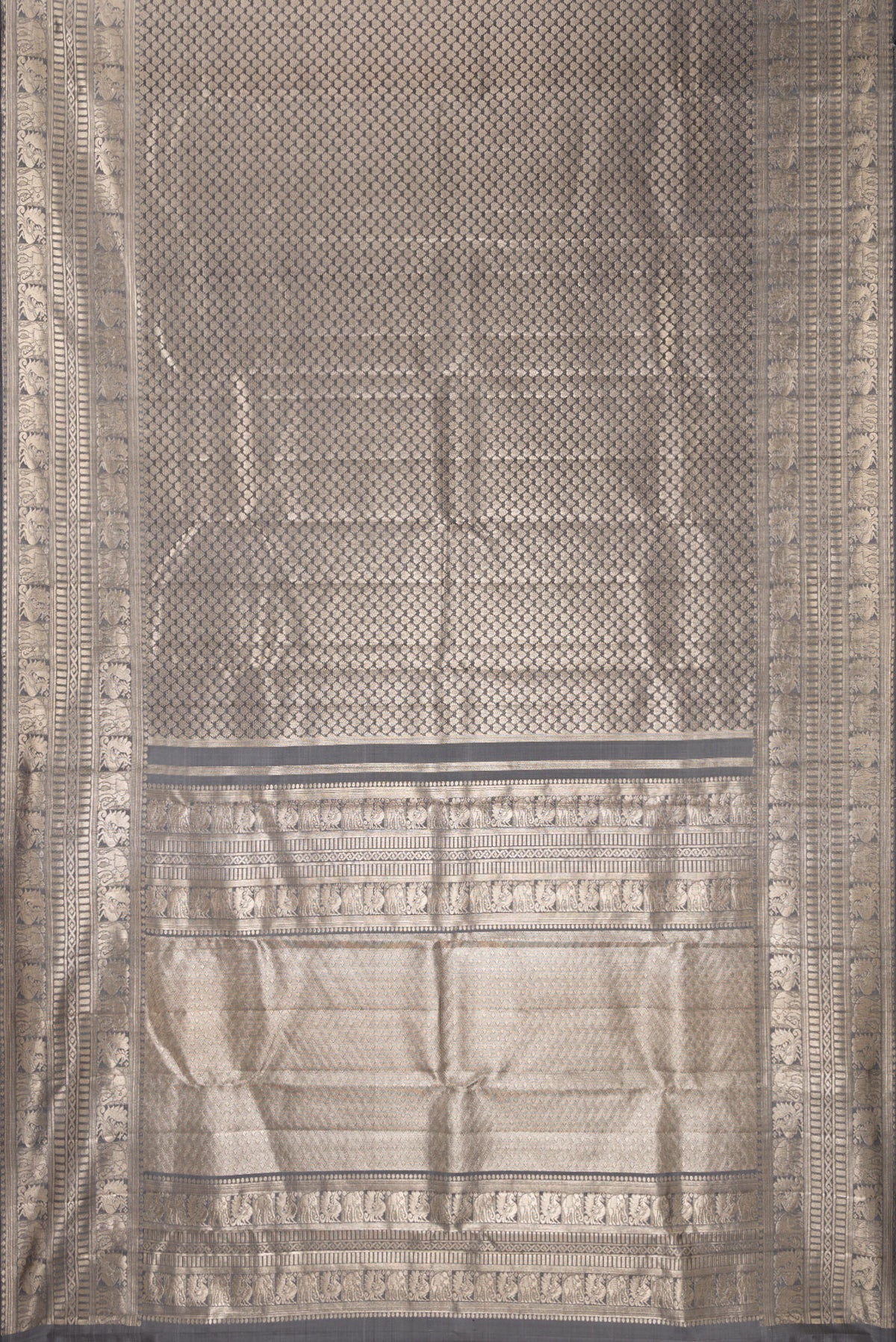 Flat view of Grey Kanchipuram Tissue Saree with Zari Brocade on the body and Fancy Border. 