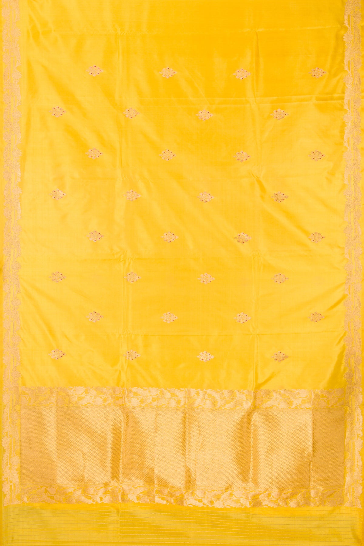 Flat view of Pure Silk Yellow Banarasi Saree with Zari Butta on the body and Zari Border. 