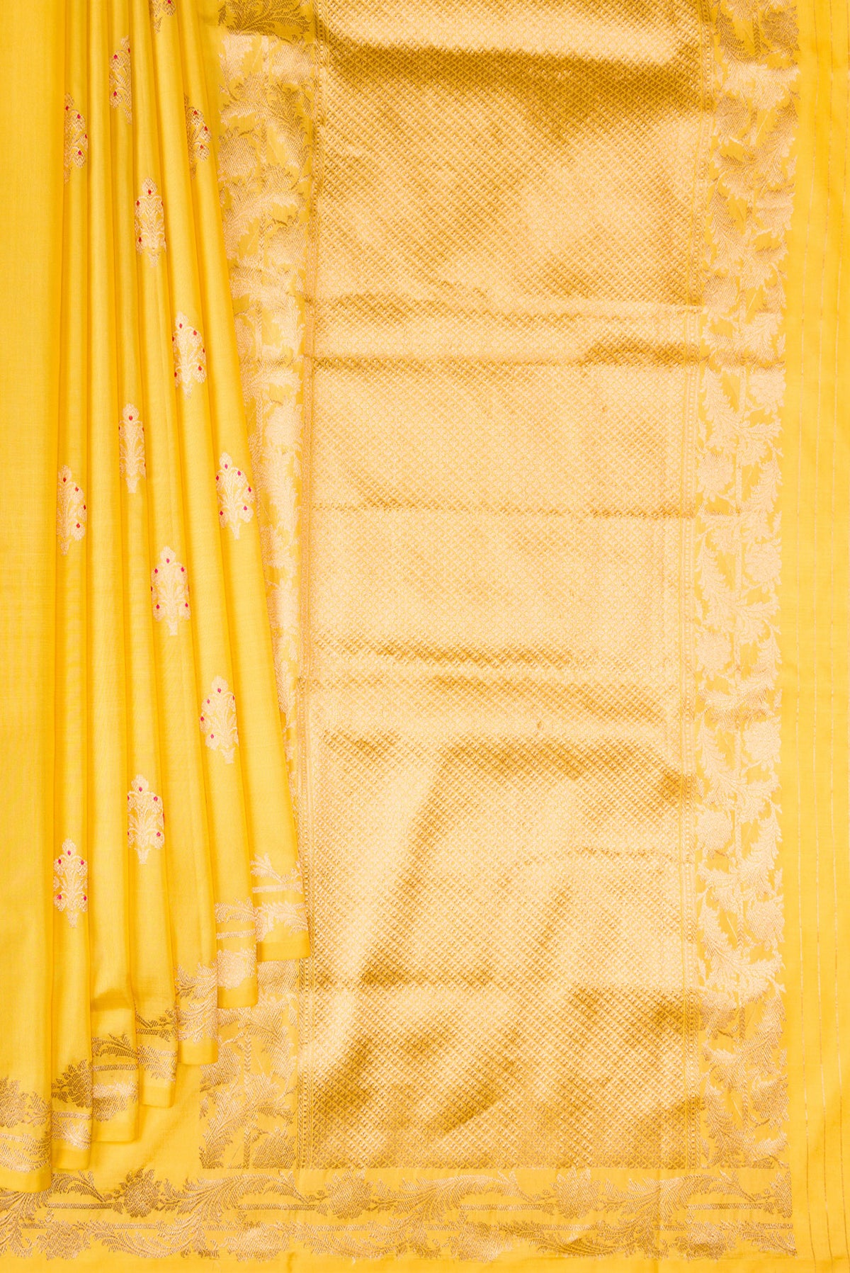 Pleats and pallu of Pure Silk Yellow Banarasi Saree with Zari Butta on the body and Zari Border. 