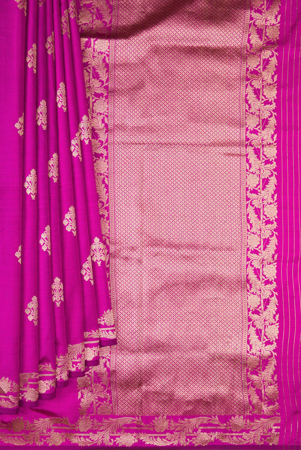Pleats and pallu of Pure Silk Rani Pink Banarasi Saree with Zari Butta on the body and Zari Border. 