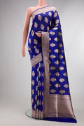 Pure Silk Royal Blue Banarasi Saree with Zari Butta on the body and Zari Border.  displayed on a mannequin