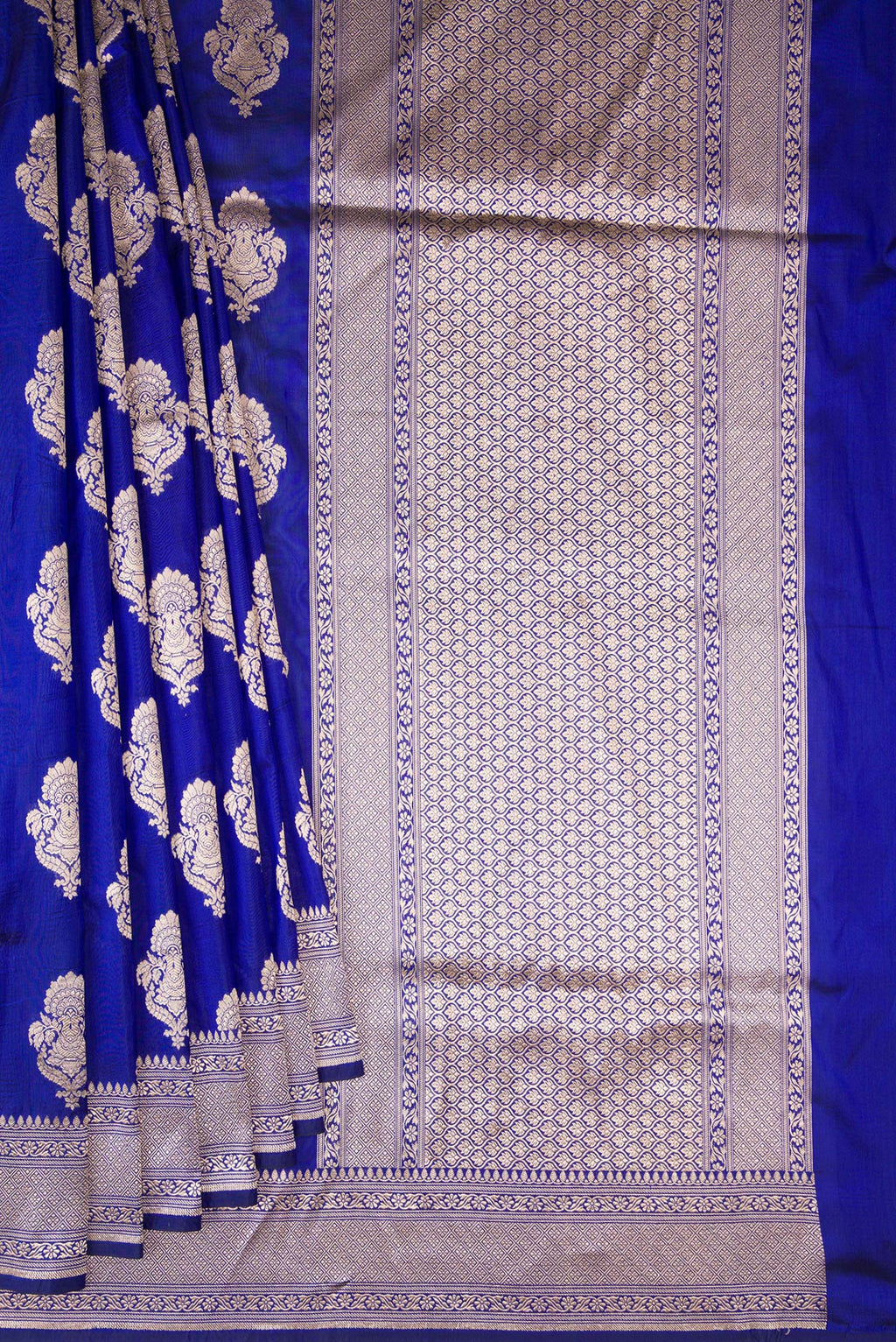 Pleats and pallu of Pure Silk Royal Blue Banarasi Saree with Zari Butta on the body and Zari Border. 