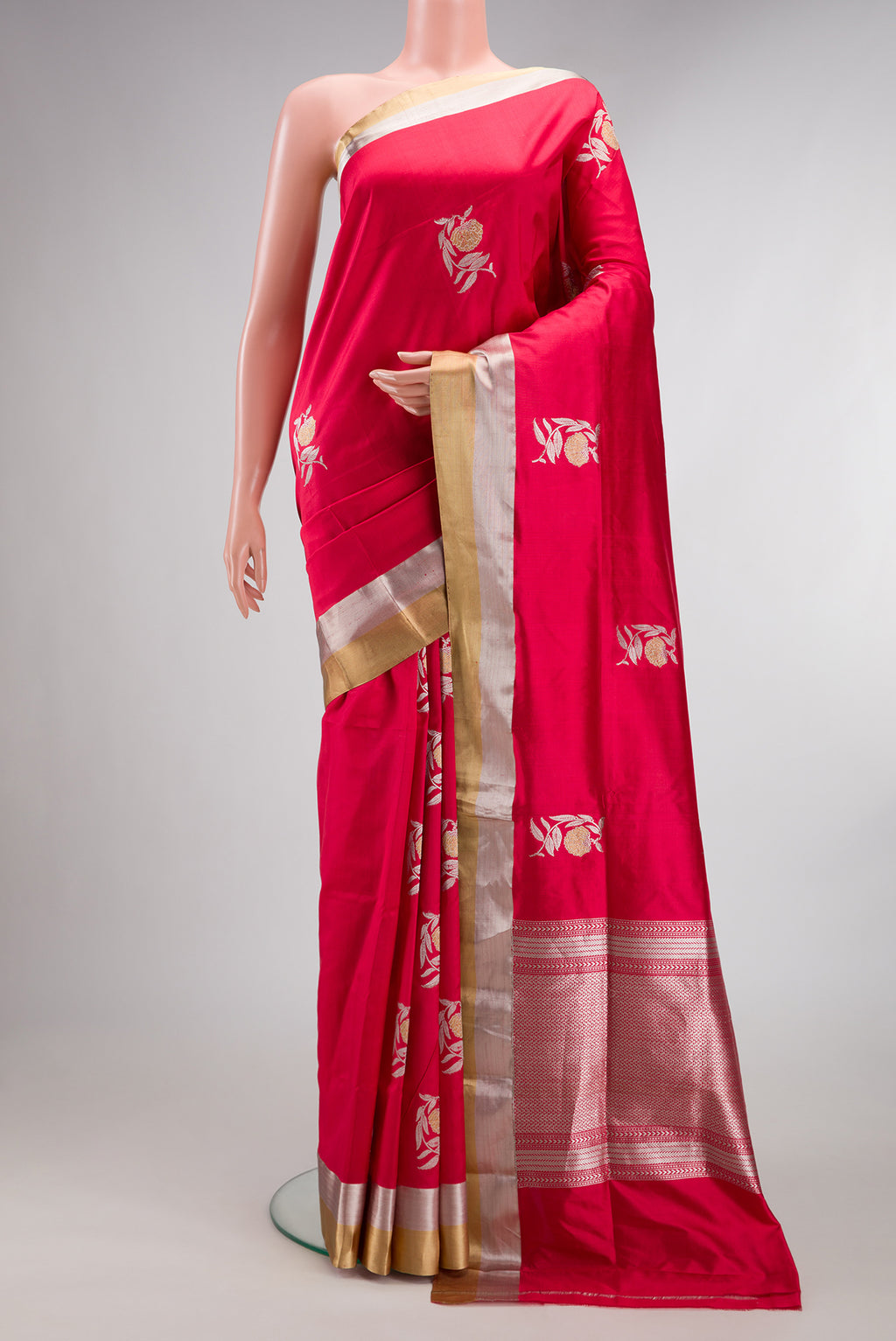 Pure Silk Red Dual Tone Banarasi Saree with Zari Butta on the body and Zari Border.  displayed on a mannequin