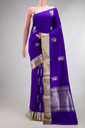 Pure Silk Royal Blue Banarasi Saree with Zari Butta on the body and Zari Border.  displayed on a mannequin